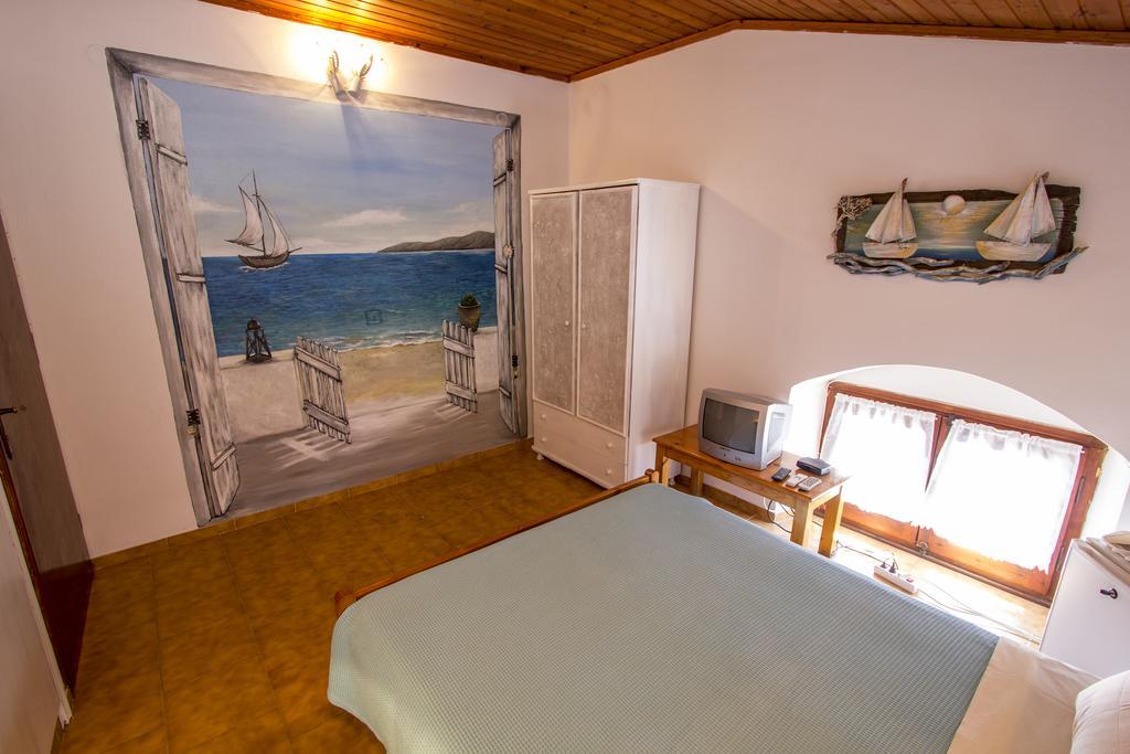 Symi Center Hotel Simi Quarto foto
