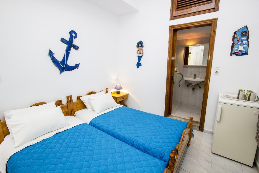 Symi Center Hotel Simi Quarto foto